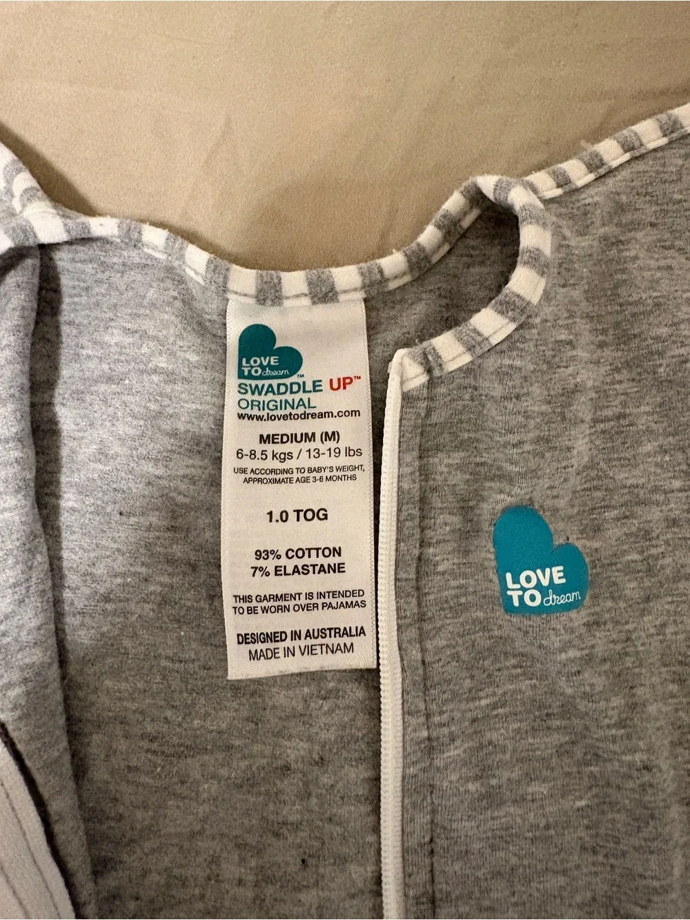 2 size M Love to Dream arms up swaddles